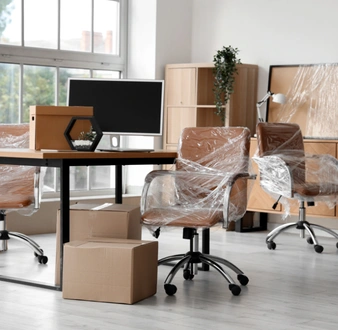 Expert packing service securing moving boxes with tape by City of Angels Move