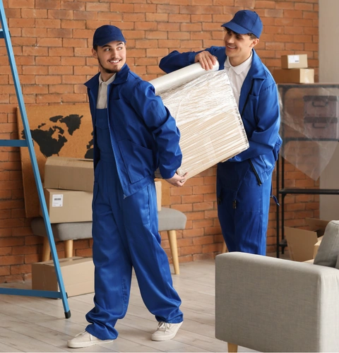 Expert movers sealing and securing moving boxes with packing tape by City of Angels Move